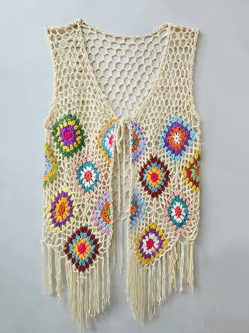 Detail of the Bohemian Sunburst Fringe Vest crochet pattern — puff-stitch sunburst motifs joined with honeycomb chain mesh
